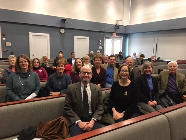 Group of community members seated at a meeting in Arlington.