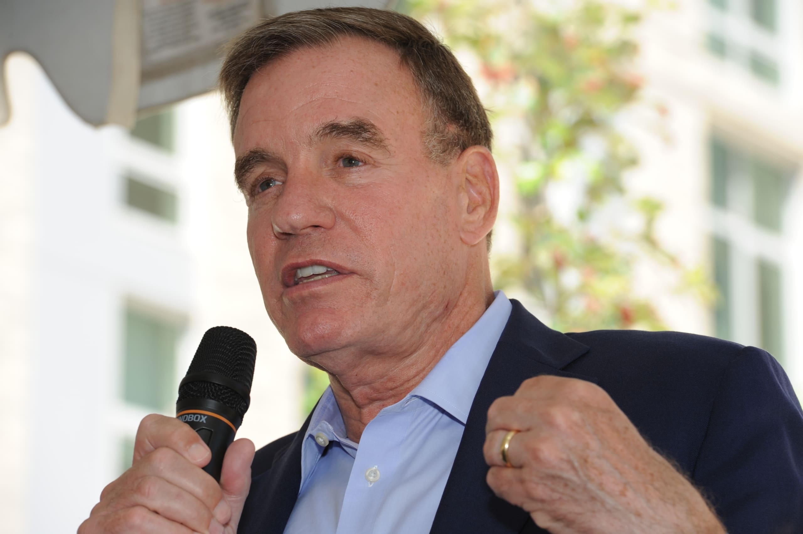 Senator Mark Warner speaks at the grand opening of Queens Court, June 2021