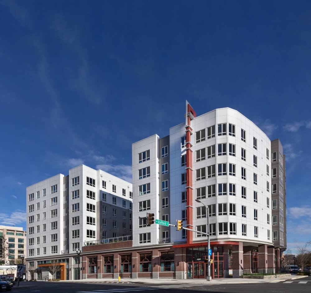 Modern apartment building with a clear blue sky in the background